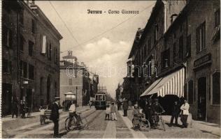 Ferrara, Corso Giovecca / street view, tram, bicycles, shops