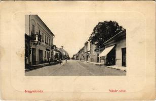 Nagykikinda, Kikinda; Vásár utca, üzletek. Pannónia papírkereskedés kiadása 1453. (W.L. ?) / street ...