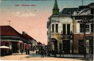 Léva, Levice; Kazinczy utca, Osztrák-Magyar Bank, Fonciere biztosító, üzletek, piac. Schulcz Ignác k...