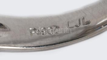 Platina gyűrű Pt 900 brill csiszolású természetes kék zafírral (0,5ct), körben beágyazott moissanito...