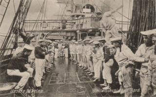 Playing mariners on the board of German warship SS Charlotte