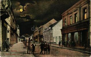 1913 Zsolna, Sillein, Zilina; Kossuth Lajos utca este holdfényben, üzletek / street view at night in...