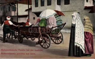 Muslim family in a carriage