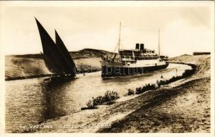 Suez, Canal, at the curve of El Guirsh, steamship, sailing boat