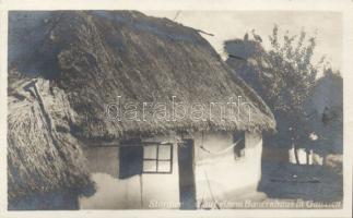 Stork nest on the top of a Galician peasant house photo