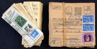 Egy köteg csomagszállító és egy köteg szelvény az 1930-as, 1940-es évekből színes bérmentesítésekkel