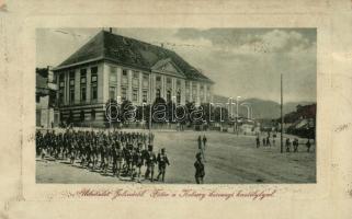 Jolsva main square, royal castle with marching soldiers