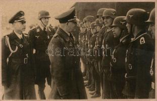 Nazi propaganda Hitler awarding soldiers