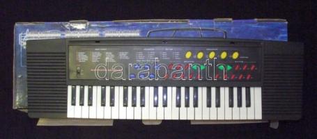 Használt működőképes elektromos billentyűzet eredeti dobozában 6 db góliátelemmel