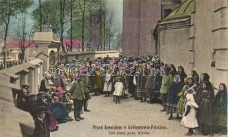 In front of a Polish church, with soldiers