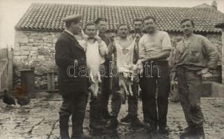 Gutting of goats real photo (fl)