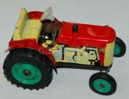 Felhúzható pléh traktor jó állapotban 9x15x10 cm