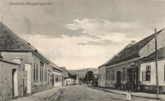 Magyarigen street with the shop of the Wolf brothers and a policeman