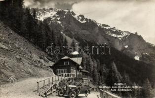 Ramsau with Hotel Dachstein and autmobile