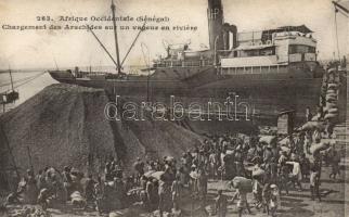 Loading a cargo ship with nuts in Western Africa