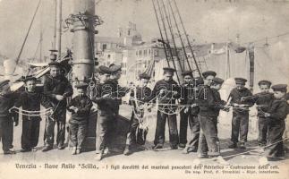 Sailor boys practicing knot tying