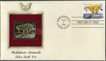 USA 1996. "Őskori Állatok/Kardfogú tigris" aranyfóliás(22kt) bélyeg replika FDC borítékban, a megegyező bélyeggel,elsőnapi bélyegzővel és ismertetővel T:1 USA 1996. "Prehistoric animals/Saber-tooth cat" gold(22kt)foil stamp replica on First Day Issue envelop with the same stamp and information C:Unc