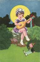 Girl plays guitar in the garden