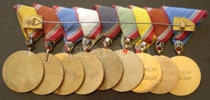 1964/65 "Szolgálati Érdemérem" 9db különböző kitüntetése mellszalaggal, együtt felfüggeszt...
