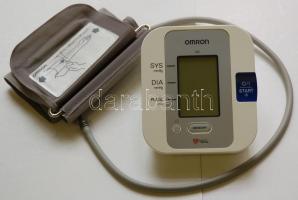 Omron márkájú felkaros digitális vérnyomásmérő tokban