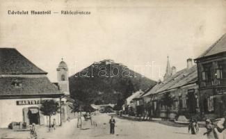 Huszt Rákóczi street with the shop of Hartstein