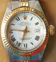 Női Rolex Datejust 18K arany és ezüst szíjas, sorszámozott automata karóra. Tartalék arany szemekkel...