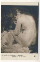 Woman warming herself s: Paul-Albert Besnard