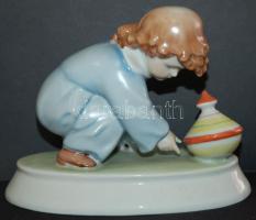 Búgócsigával játszó gyermeket ábrázoló kézzel festett jelzett Zsolnay porcelán figura hibátlan állapotban "Sinkó" jelzéssel/ Handpainted Zsolnay chinaware figure in flawless condition 13x15cm