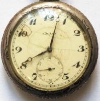 Cca 1907  Doxa zsebóra, fém, másodperc mutatós, hátoldalán vízilabdázók, müködőképes, sérült számlap...