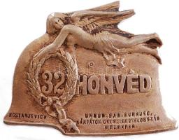 Osztrák-Magyar Monarchia ~1915. A 32. Honvéd Gyalogezred - Kárpátok Oroszlengyelország tombak sapkajelvénye. Szign.: MORZSÁNY J. BUDAPEST / IV. ESKÜ ÚT 5. (40x52mm) T:2 Austro-Hungarian Monarchy ~1915. Royal Hungarian 32nd Regiment "32. HONVÉD / KOSTANJEVICA / UHNOW, SAN, DUNAJEC. - KÁRPÁTOK OROSZLENGYELORSZÁG - WOLHYNIA" tombac cap badge. Sign: MORZSÁNY J. BUDAPEST / IV. ESKÜ ÚT 5. (40x52mm) C:XF