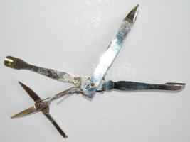 Manikűrös készlet fém tartójában