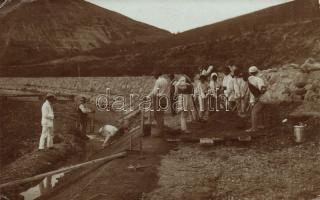 Ditró construction workers by the river photo