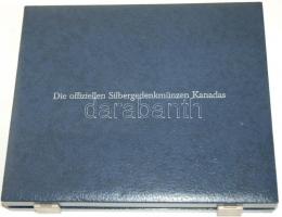 Műbőr borítású(kékesszürke) fa éremtartó kazetta, 1db plüss kivehető tálcával, összesen 32db érme tá...