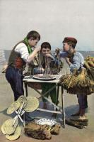 Naples boys are eating macaroni