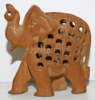 Kézzel, egy tömbből faragott fa elefánt belsejében kis elefánttal /  Wooden elephant figure handcarved from one piece with a small elephant inside, 8x8x3cm