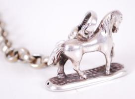 cca 1900 Ezüst (Ag) lovacska óralánccal / 
Silver horse figure and a pocket watch chain, 3x2/27cm, 8...
