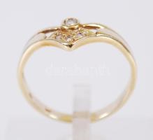 14K Arany (Au.) gyűrű, jelzett, cinkónkövekkel bruttó: 2,7 g, mérete: 56