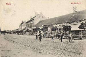 Makó Fő tér, Vidor Manó órás üzlete, Neumann Zsigmond és Halász A. üzletei (EB)