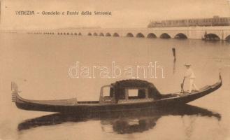 Venice gondola and the railroad bridge with train