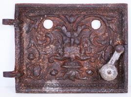 cca 1900 Kaláni öntöttvas kályhaajtó Héphaisztosz-fejjel és növényi motívumokkal díszítve /  Cast iron stove door, 22x16cm