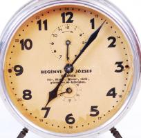 cca 1940 Ébresztőóra a veszprémi Regényi József üzletéből, tisztításra szorul / 
Vintage alarm clock...