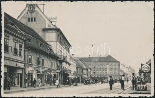 Segesvár the shops of Török and Wolf, F. Bachner, Lucretia Carausiu, Ford shop, gas station, hotel, automobiles (EK)