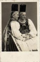 Romanian girls in folklore costume (small tear)