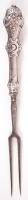 1872-1922 Húsvilla poncolt növényi díszítésű, 800-as tisztaságú bécsi jelzéssel ellátott ezüst (Ag) nyéllel /  Carving fork with silver handle, 800 fineness Viennese hallmark, 20,5cm, br: 32,1gr
