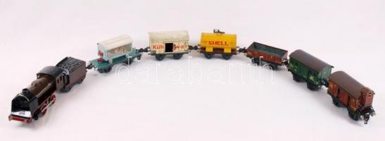 Cca 1930 Marklin mozdony és vagonok, felhúzókulcs hiányzik, két vagon hiányos, jelzettek, jó állapot...