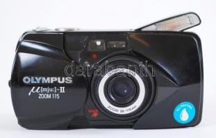 Olympus fényképezőgép, állvánnyal, filmmel, elemekkel / Olympus camera with tripod, film and battery