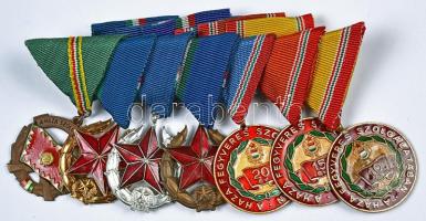 7db szocialista kitüntetés együtt felfüggesztve, közte 1964. "Haza Szolgálatáért bronz" + "Közbiztonsági Érdemérem arany/ezüst/bronz" + "Szolgálati Érdemérem 10-15-30 év után" kitüntetések a hozzávaló szalagsávokkal együtt T:1,1-