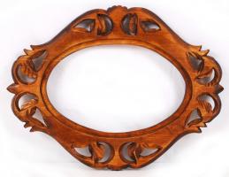Ovális faragott keret, gazdagon díszítve, pácolt hársfa, 41×31 cm