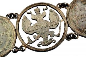 Oroszország 1909-1914. 10K Ag (6x) + 15K Ag (3x) + 20K Ag karkötőként összefűzve T:vegyes sérült Russia 1909-1914. 10 Kopeks Ag (6x) + 15 Kopeks (3x) + 20 Kopeks Ag coins on bracelet C:mixed damaged