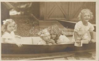 Otto, Adelheid, Robert, Felix, the children of Charles IV and Zita in their boat
